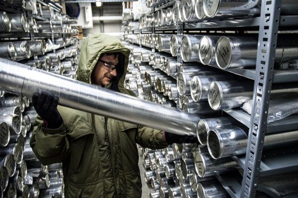 A Byrd Center researcher pulls an ice core for analysis.