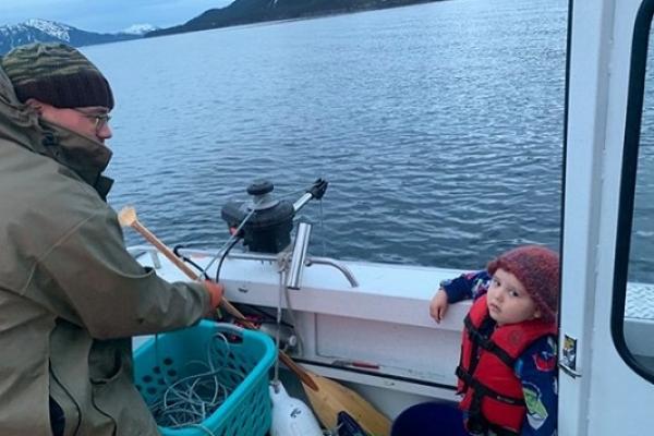 Kaare Erickson and his son while shrimp fishing